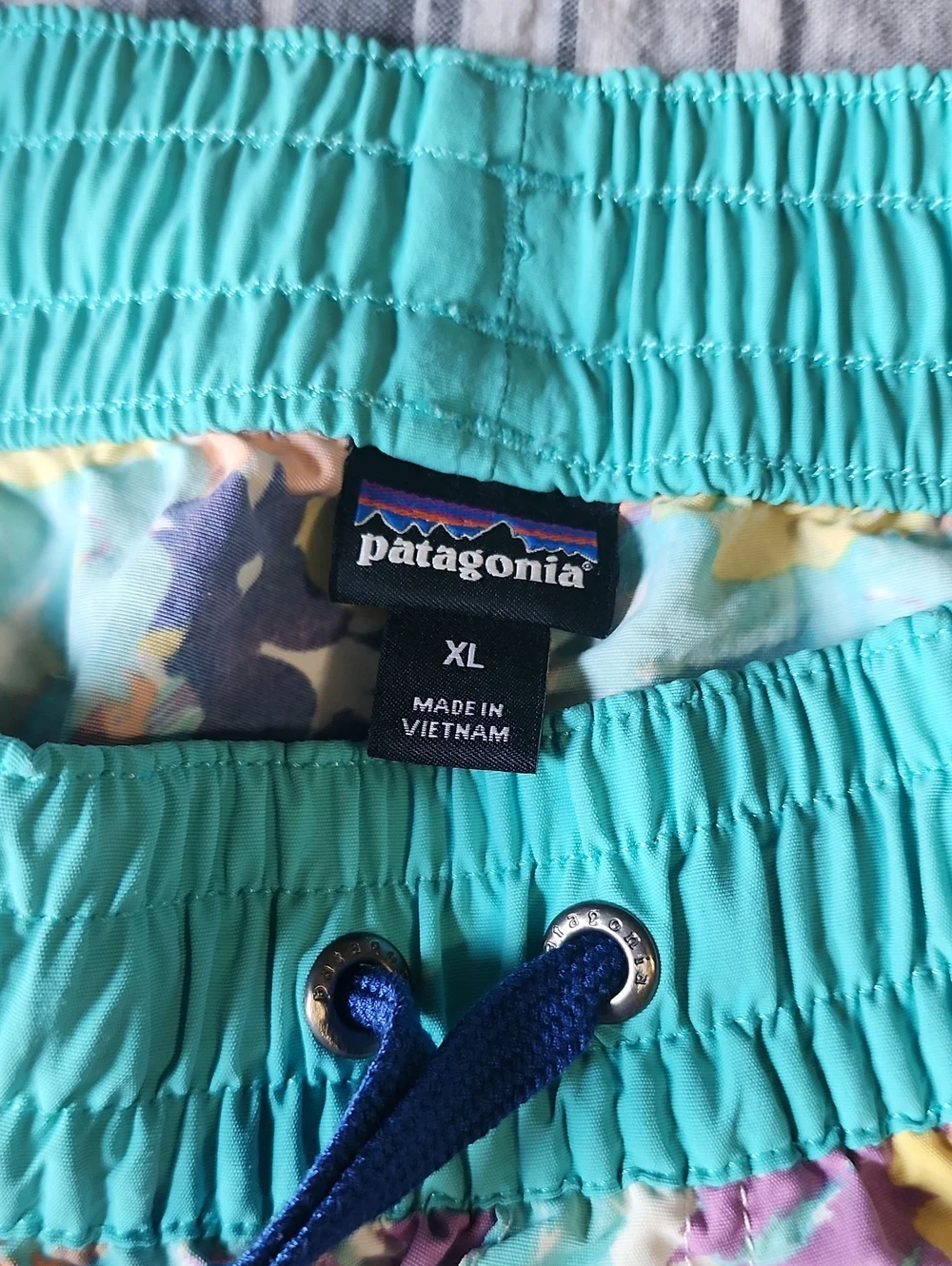 Patagonia Teal Floral Swim Shorts with Yellow & Purple Accents